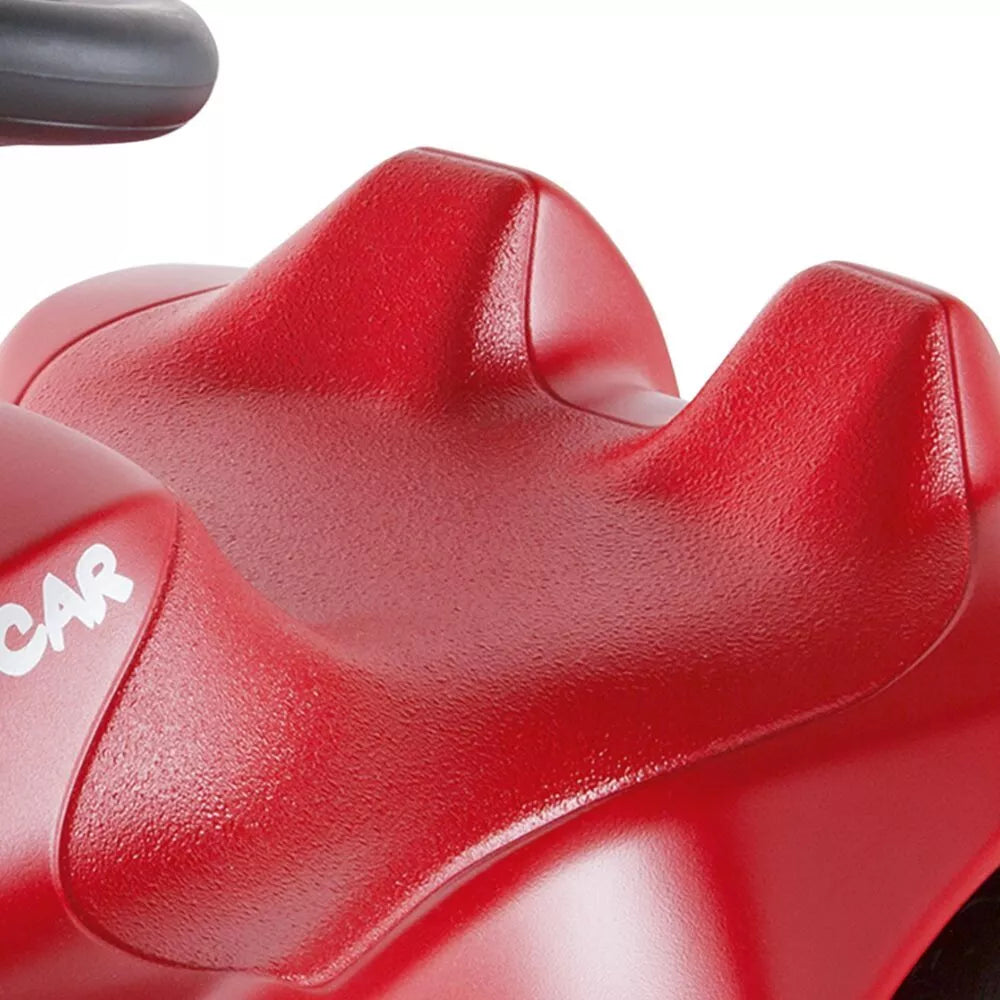 Raudonas paspiriamas automobilis