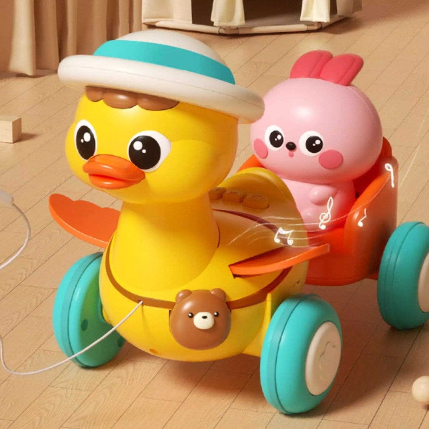 WOOPIE BABY Geltona antis su rožiniu zuikiu traukiamoje priekaboje