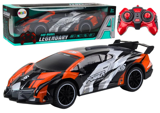 R/C sportinis automobilis 1:10 – pilkas ir oranžinis, iki 25 km/val.