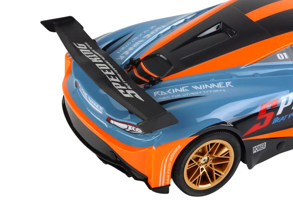 Nuotolinis sportinis automobilis oranžinis
