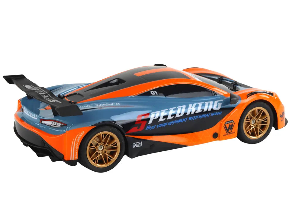Nuotolinis sportinis automobilis oranžinis