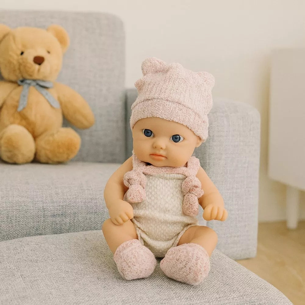 18 cm kūdikio lėlytė su smėlio spalvos bodžiuku ir rožiniais akcentais