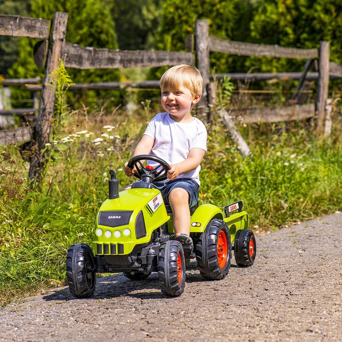 Falk Claas Arion 410 pedalinis traktorius iš 75% perdirbto plastiko su priekaba