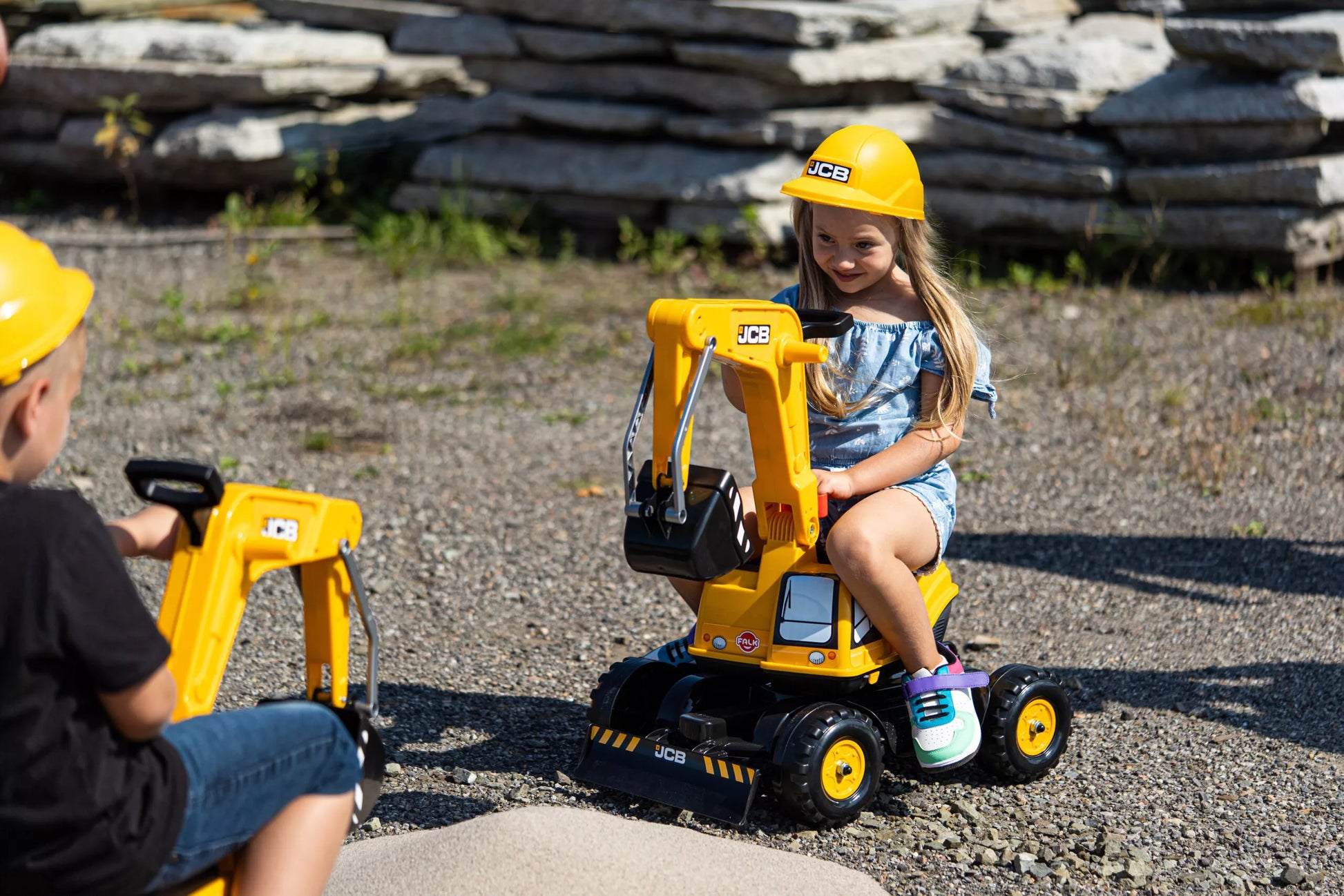 Falk JCB ekskavatorius–stumdukas su 360° strėle ir apsauginiu šalmu