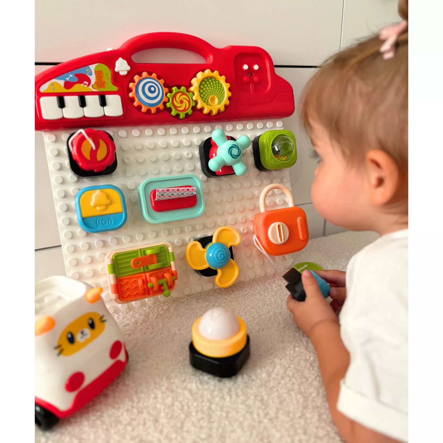 WOOPIE BABY Montessori manipuliacinė lenta – spalvingas veiklų skydelis