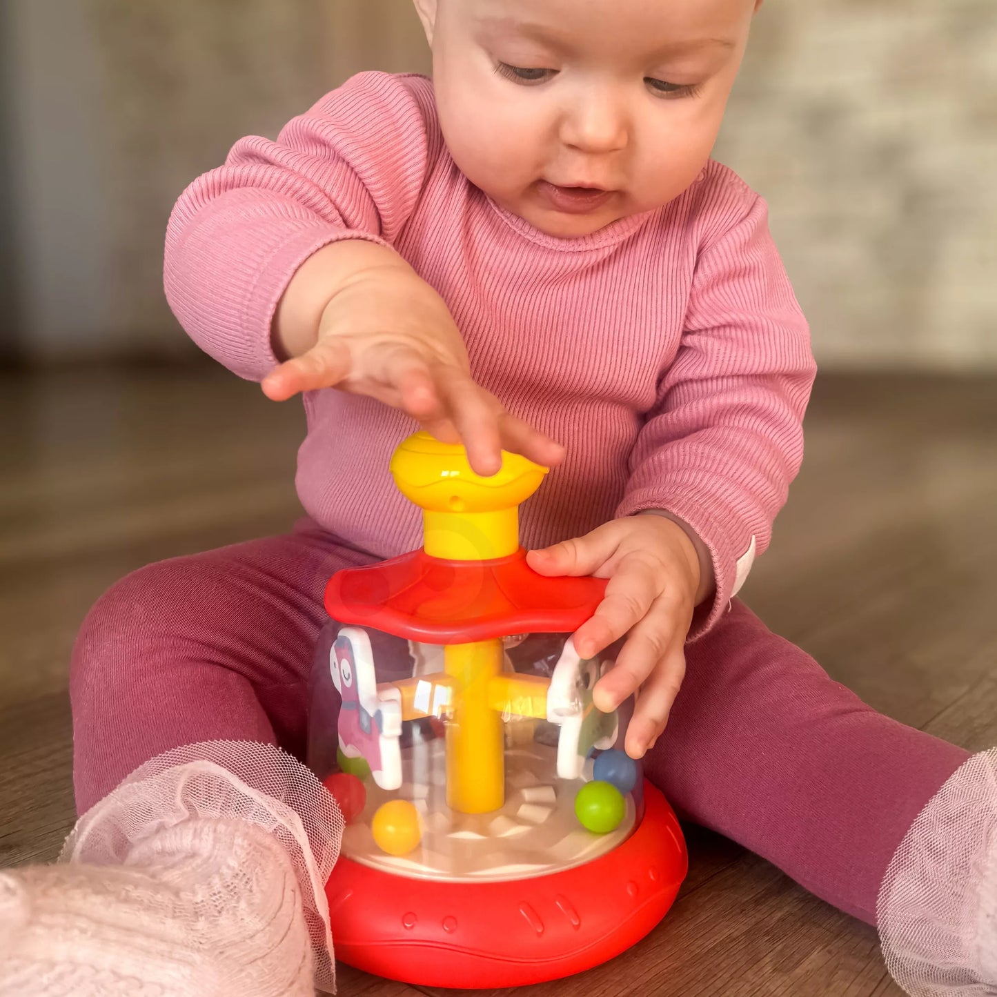 WOOPIE BABY spalvingų arkliukų raudona besisukanti karuselė (vilkelis)