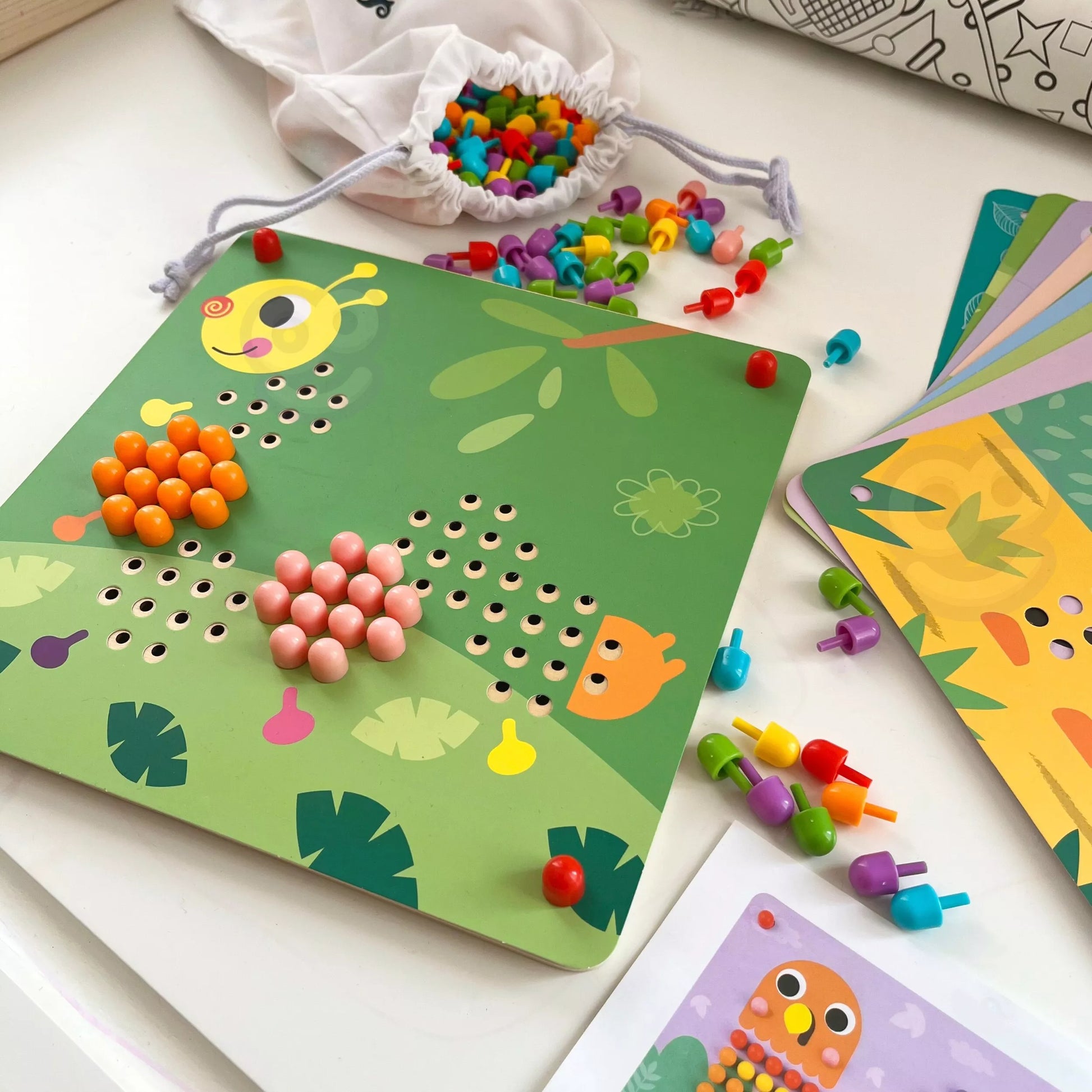 TOOKY TOY dėlionė su kaiščiais ir lipimo detalėmis