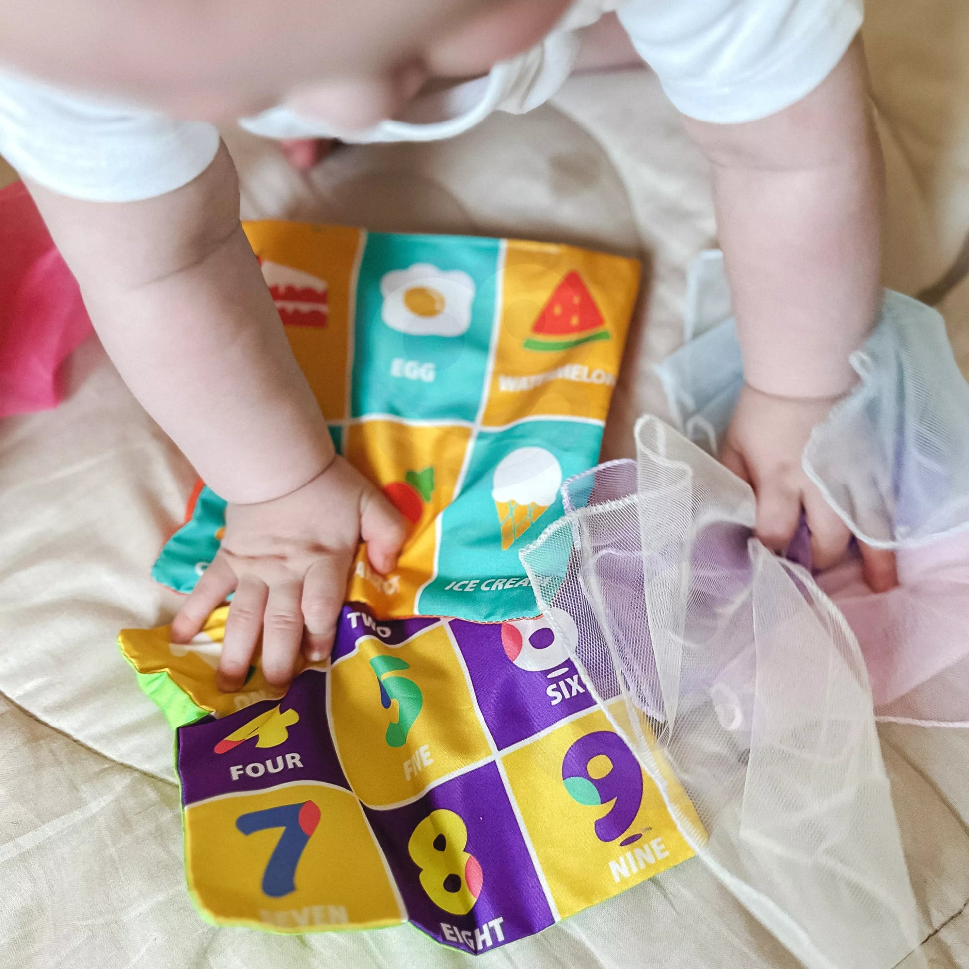 WOOPIE BABY lavinamųjų sensorinių žaislų servetėlių dėžutė