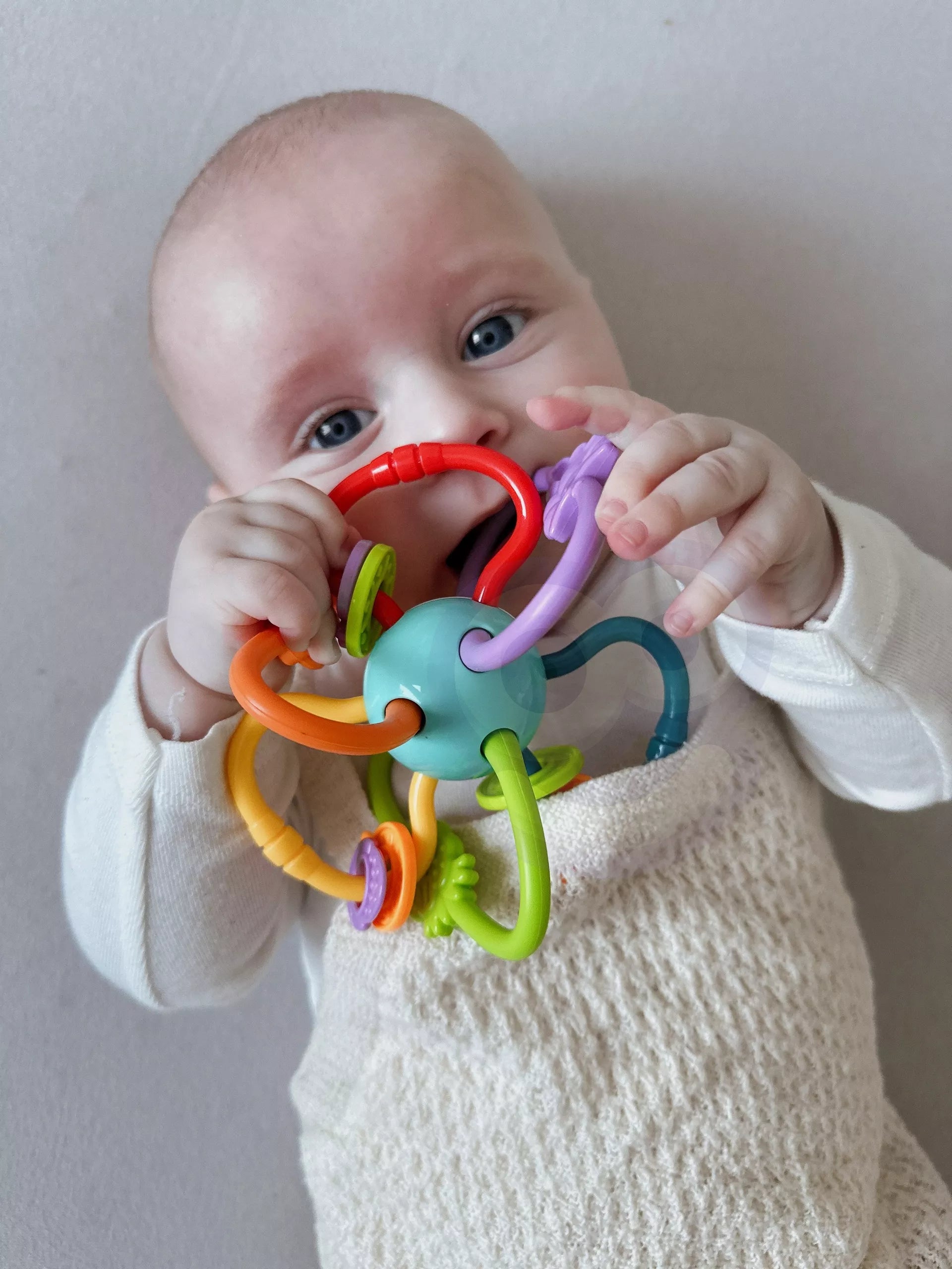 Woopie sensorinis žaislas–gryzakas 2in1