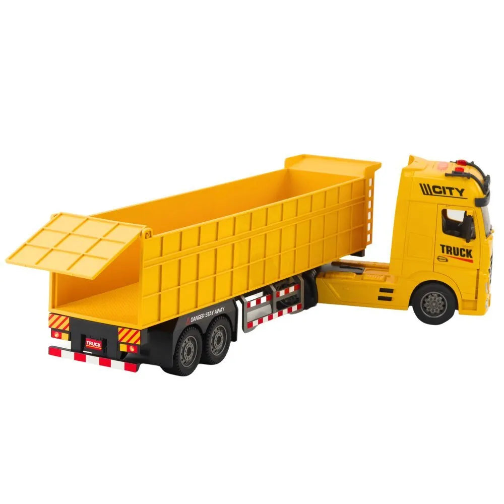 Geltonas transporto sunkvežimis su priekaba