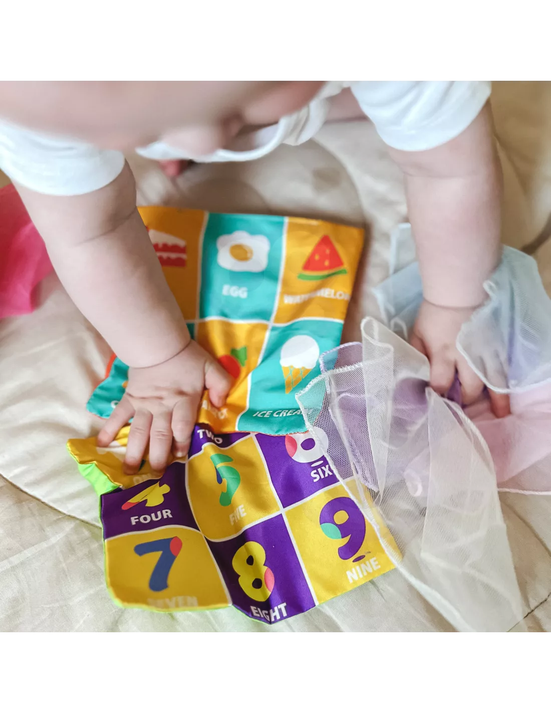 WOOPIE BABY edukacinis sensorinis žaislas „Lady Tag“ servetėlių dėžutė