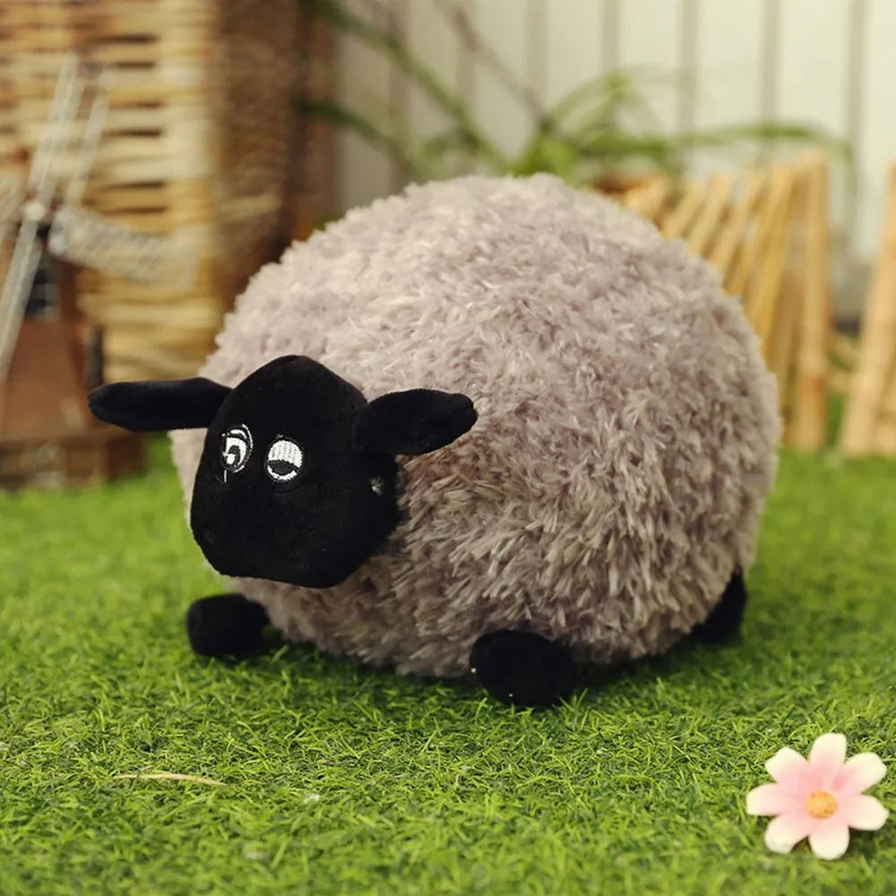 Pliušinė avytė su garbanotu kailiuku 20 cm