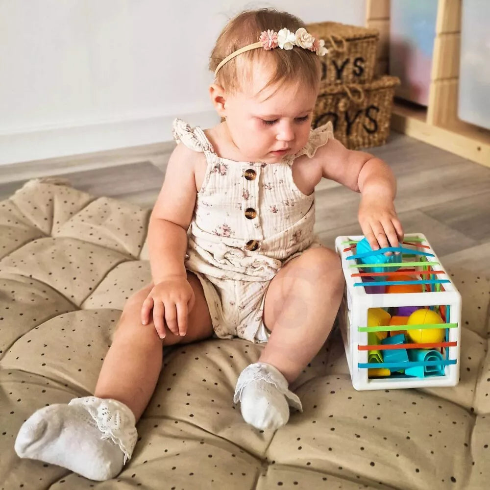 Lankstus sensorinis kubelių rūšiuotojas vaikams spalvingų formų abėcėlė 15 vnt. WOOPIE BABY