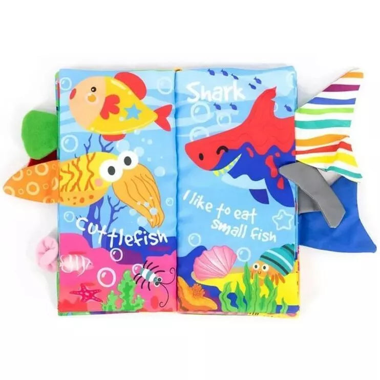 WOOPIE BABY Čerškiančių audinių knyga su jūros gyvūnų uodegomis