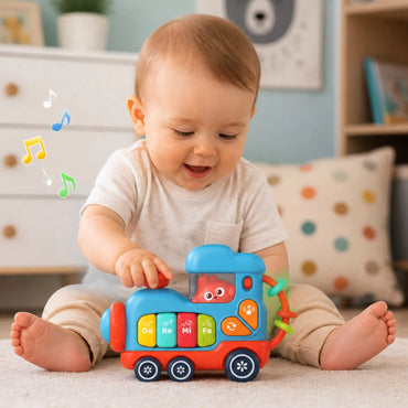 Woopie Baby muzikinė lokomotyvėlė–pianinas
